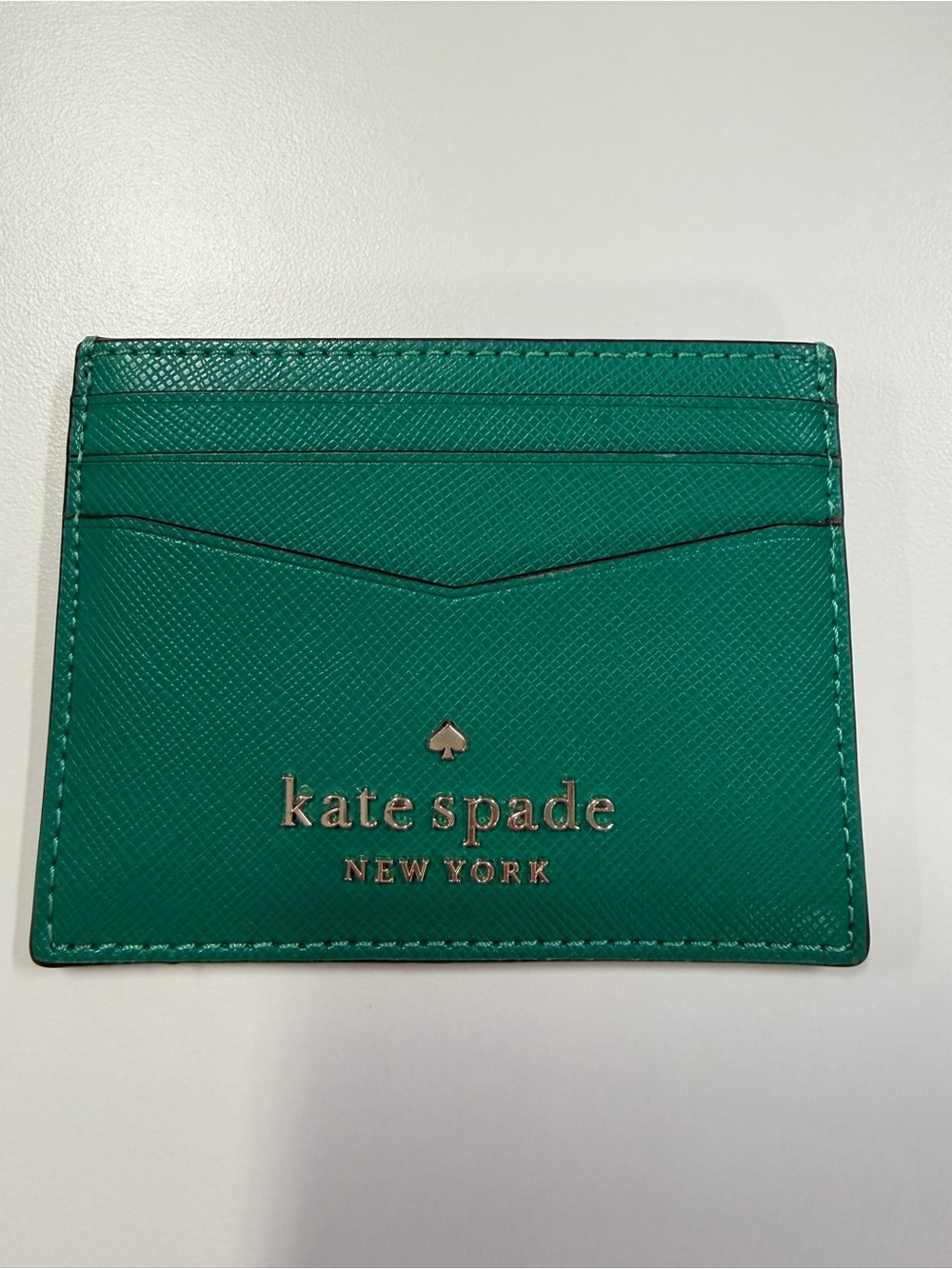 Kate Spade Green leather card holder w/ gold logo